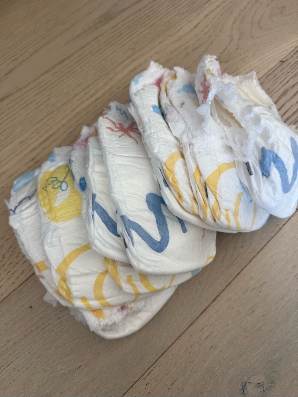 Coterie Kids Swim Diaper - White with Pink & Yellow Print. Small. 11 diapers - Picture 4 of 5